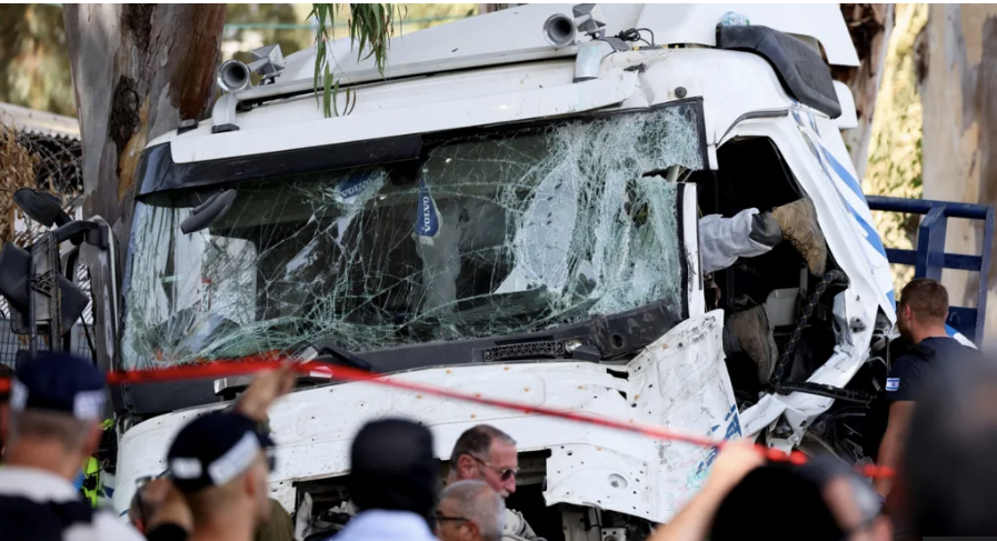 One dead, dozens injured after truck hits Israel bus stop