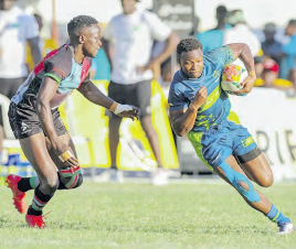 Amon Wamalwa of Quins squares up to KCB's Samuel Asati during a past match