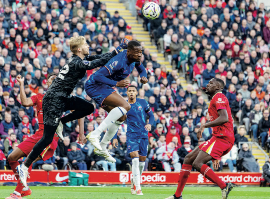Liverpool goalkeeper Caoimhin Kelleher (L) in action against Chelsea on October 20
