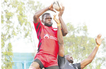 Impala's Cosmas Valentino wins a line-out against Mwamba Tony Owuor