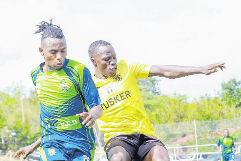 Tusker's George Kaddu and KCB's Francis Kahiro in recent action