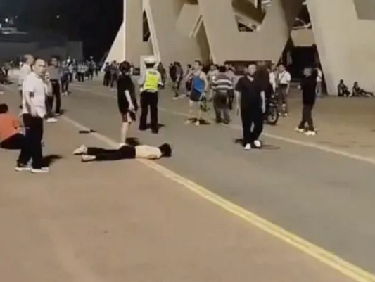 Several injured after car ploughs into crowd in China
