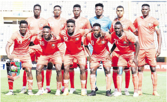 Harambee Stars line-up after their recent match against Cameroon in Kampala