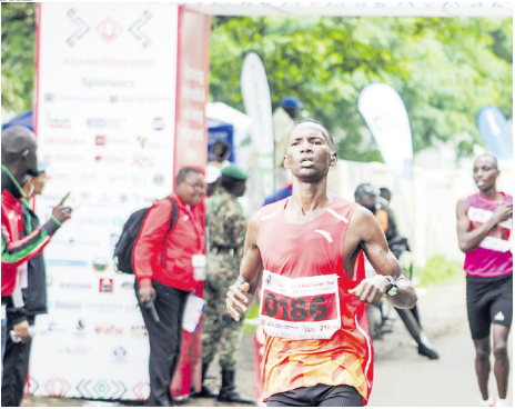 Jonathan Korir after winning the men's 21km race at the World Aids Day Marathon