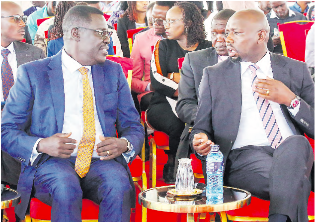 Sports CS Kipchumba Murkomen with his PS Peter Tum during the launch of CHAN/Afcon Local Organising Committee