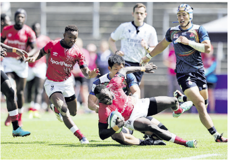 Patrick Odongo tackled by a Japanese opponent during the Challenger Sevens Series 2024 /HANDOUT