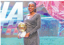 Lydia Akoth poses with the MVP trophy during last year's FKF gala/FILE