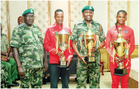 Commissioner General of Prisons with AK Prisons Sports Council Chair and other athletes at the Kenya Prisons Headquarters. /TEDDY MULEI