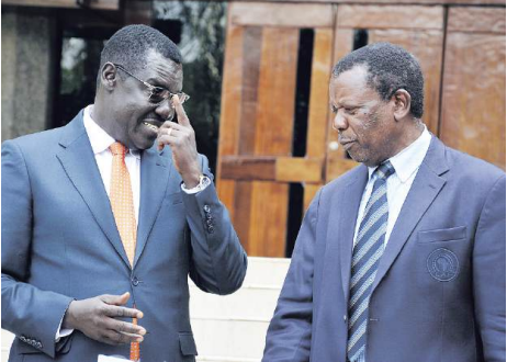 Sports PS Peter Tum with CHAN LOC chairman Nicholas Musonye /CHARLENE MALWA