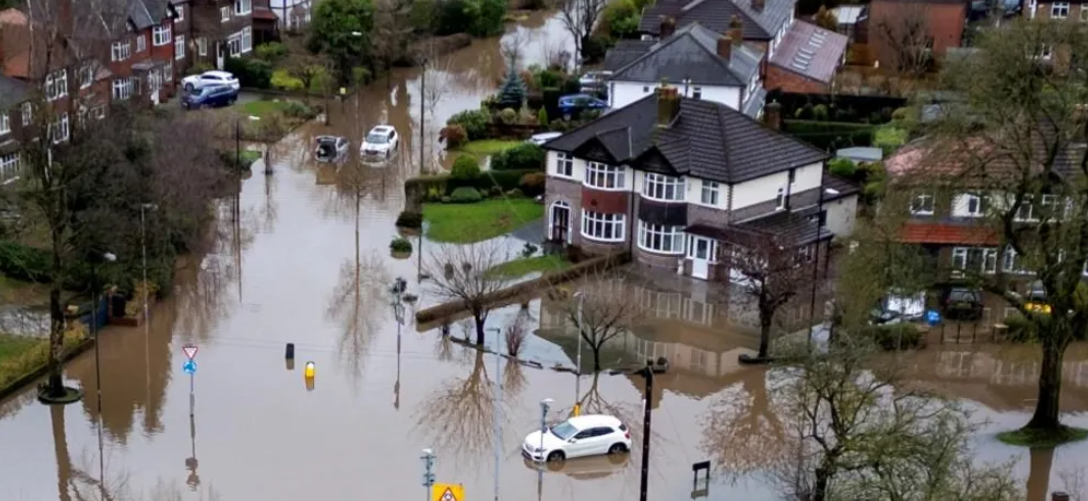 Homes flooded, weather warnings on New Year's Day