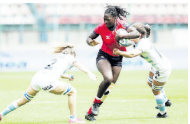 Phoebe Akinyi fends off two Argentina defenders in a past match /HANDOUT