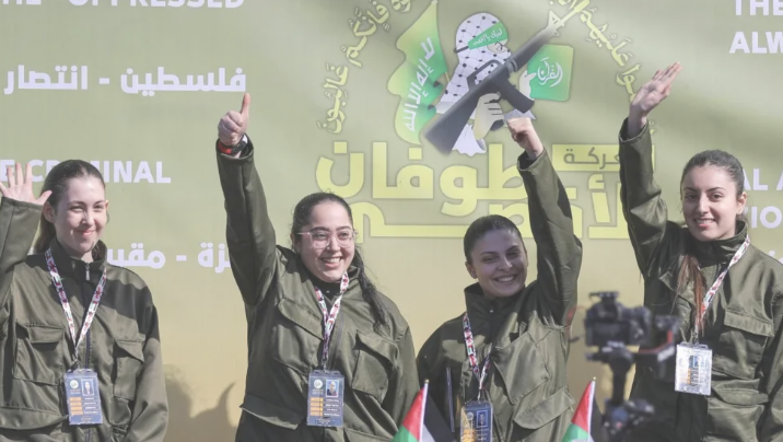 Four Israeli hostages released by Hamas in carefully-staged handover