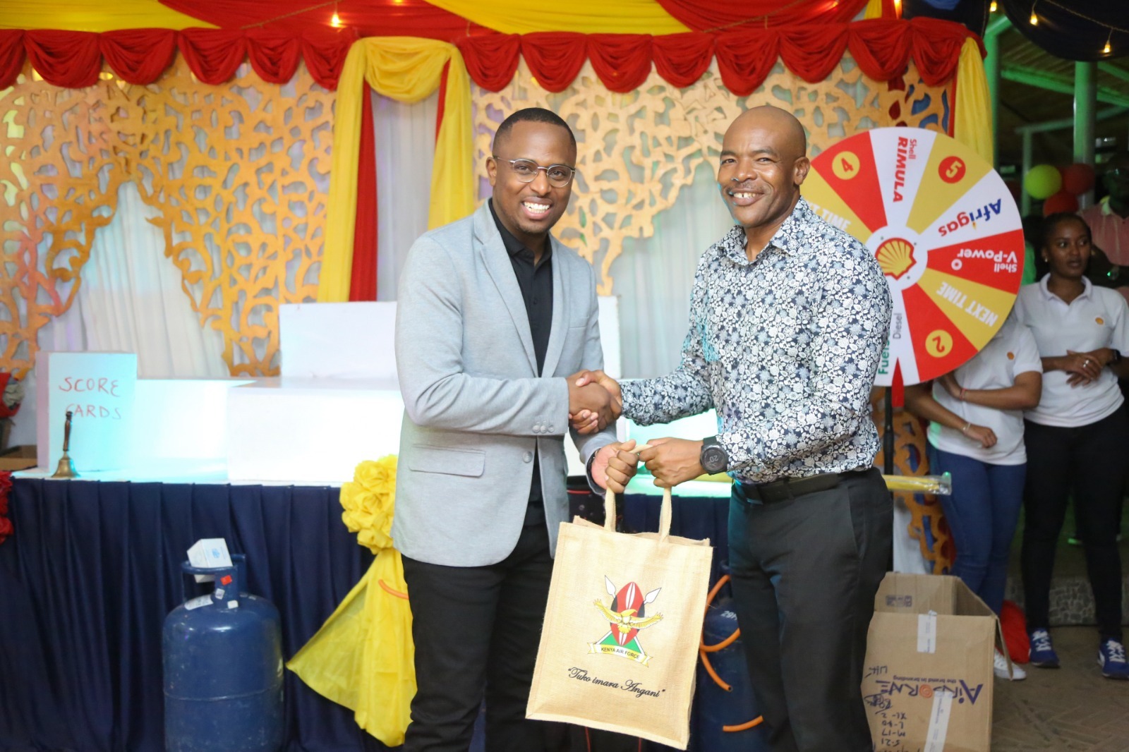 Vivo Energy Kenya Commercial Manager Mark Senteu with Kenya Air Force Golf Club chairman Col. Evans Oduma, during the awards ceremony at the  Kenya Air force Golf Club