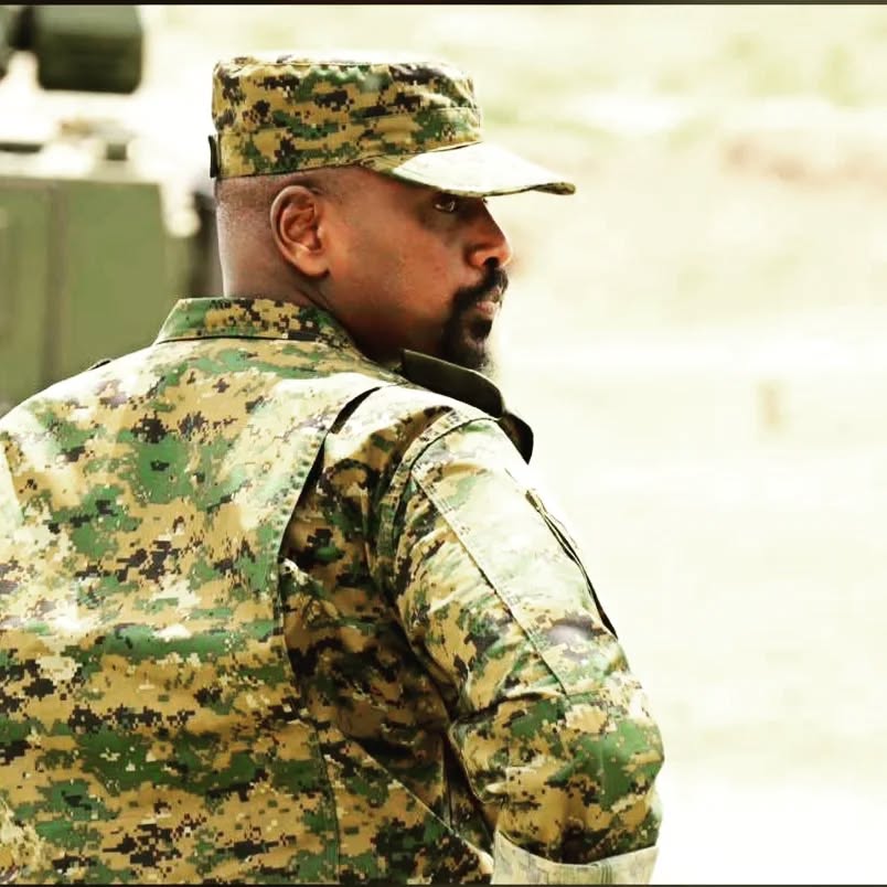 Museveni’s Son Orders Police to Cane Bobi Wine