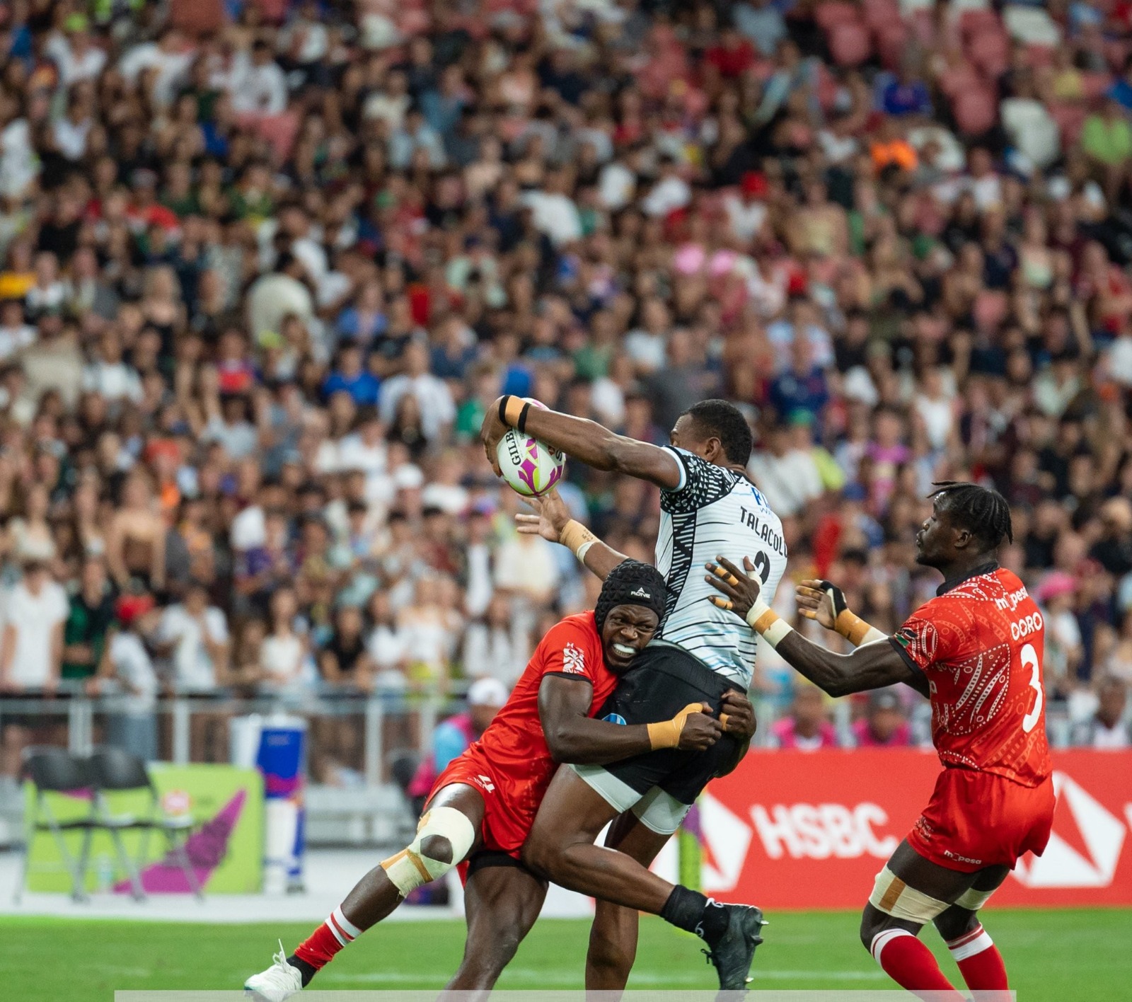 Kenya sevens in action at the Singapore sevens finals against Fiji. [PHOTO: SHUJAA X