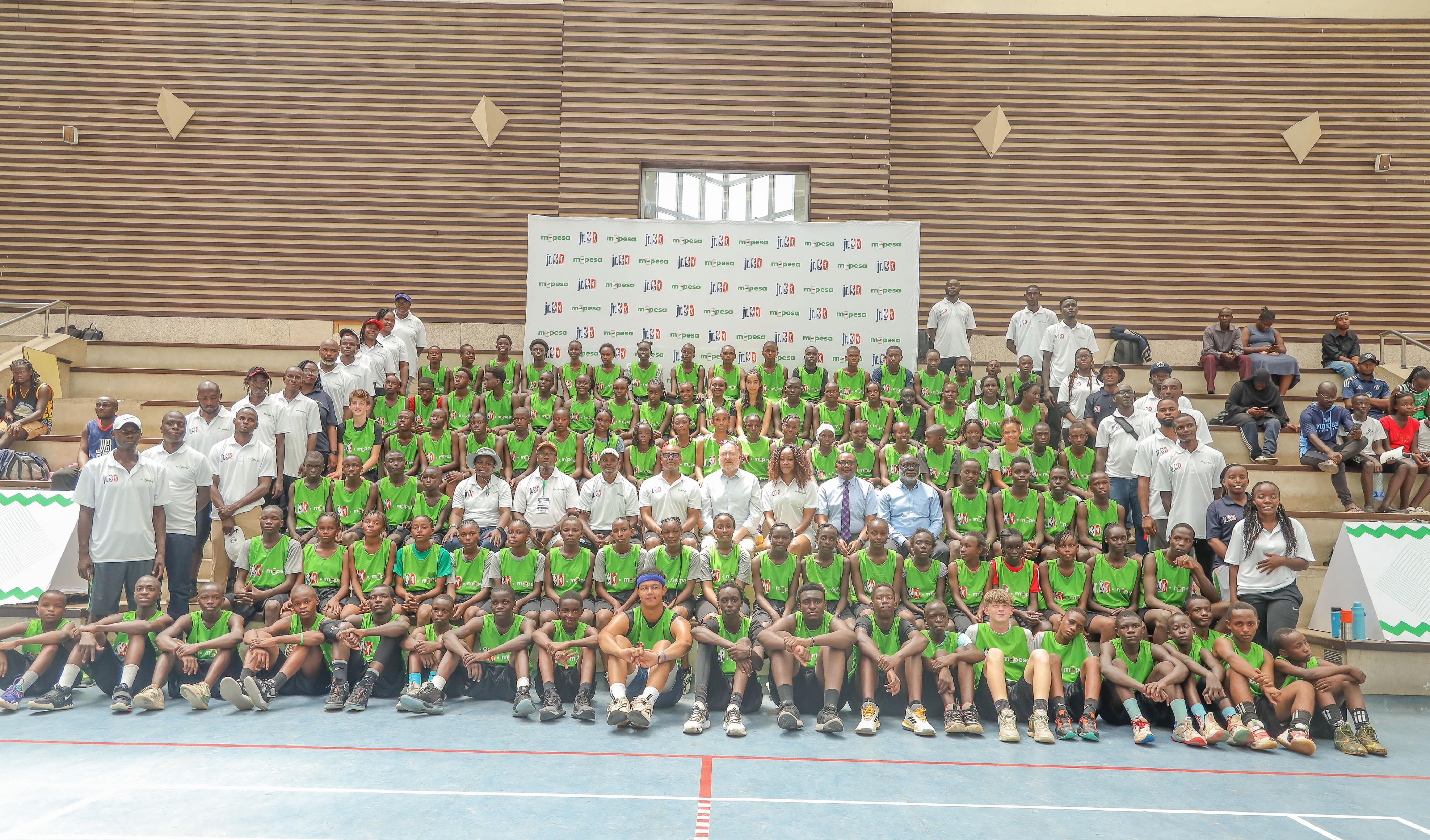 The 100 basketballers who attended the elite training camp pose for a photo