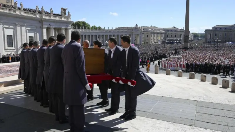Pallbearers prepare Pope's coffin for final journey