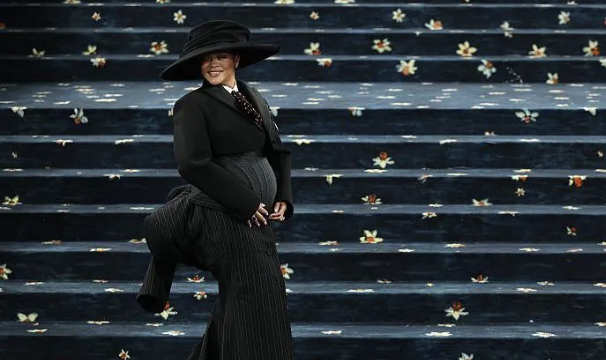Rihanna reveals she is pregnant with third child at Met Gala