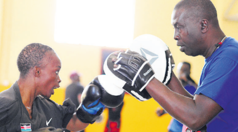 Coach Benjamin Musa with Christine Ongare in a past training session / FILE