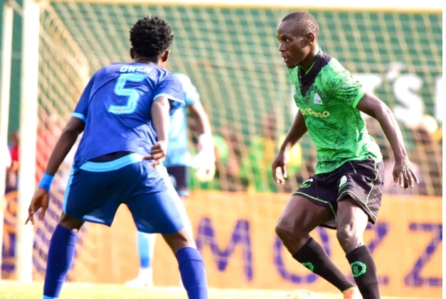 Alpha Onyango (R) of Gor Mahia takes on Michael Owen of Murang'a Seal during their FKF Cup semifinal clash at Dandora Stadium on Sunday/HANDOUT