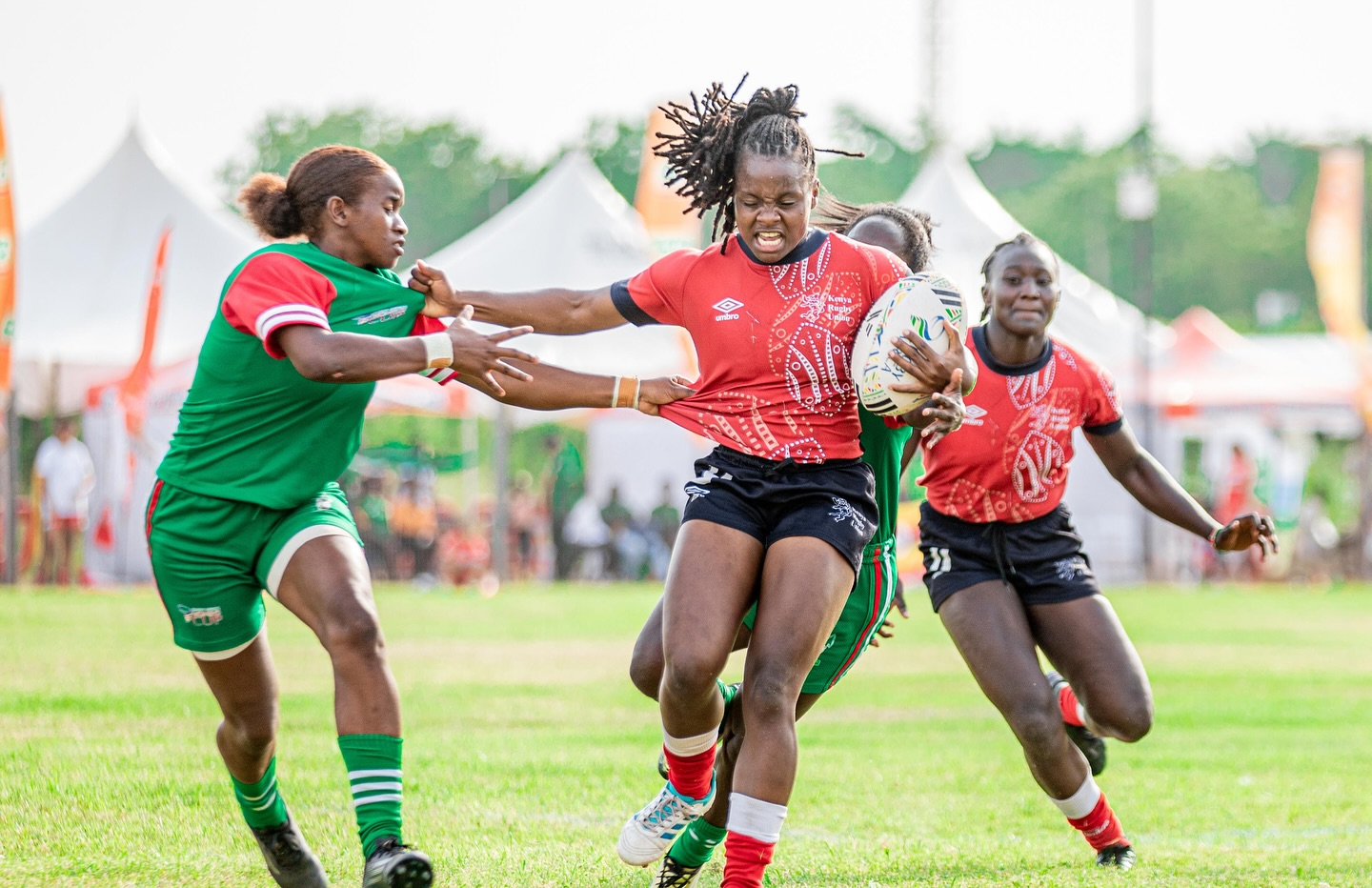 Kenya Lionesses' Judith Auma shrugs off a Malagasy opponent during the Africa Cup tournament last year