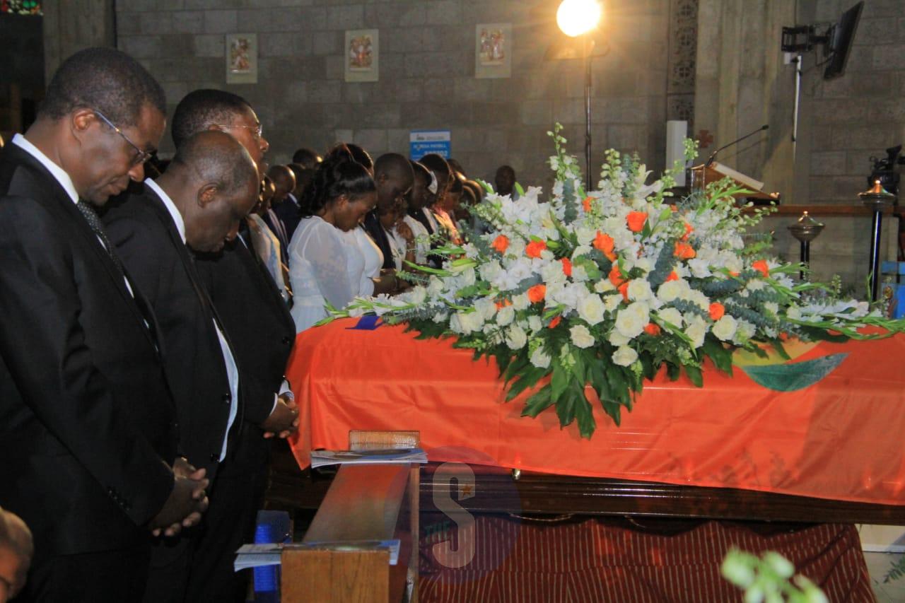 [PHOTOS] Sombre mood highlights Were memorial service