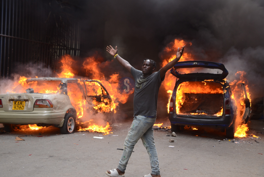 [PHOTOS] Protests turn chaotic as protesters destroy property