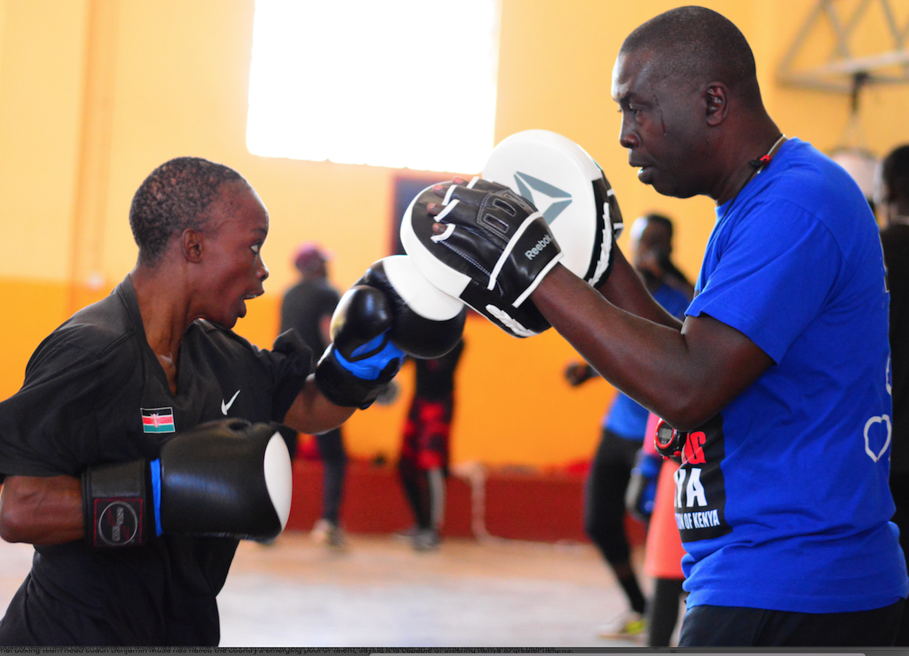 Coach Benjamin Musa with Christine Ongare in a past training session