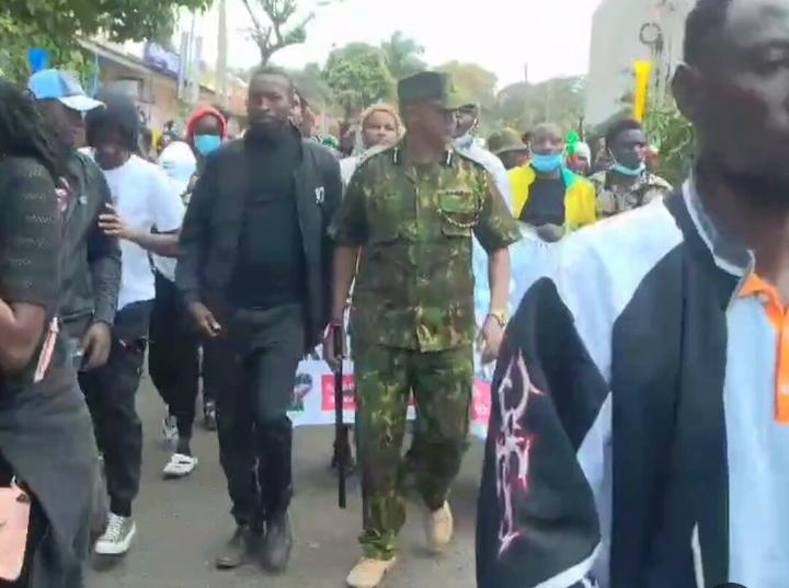 Imenti North OCPD hands out sodas to protesters