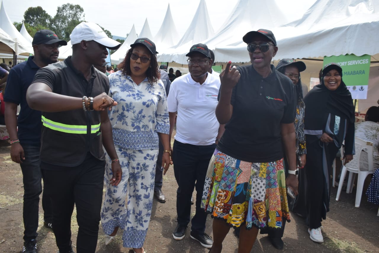 CEO of the Council of Governors Mary Mwiti, Safaricom Foundation chairman Joe Ogutu and Homa Bay Health Executive Mercy Osewe in Mbita,Homa Bay county