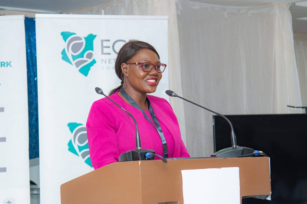 Carren Achieng Ageng'o, the PS for the State Department for Children Welfare Services speaking in Garissa during the 6th National Early Childhood Stakeholders’ Conference.