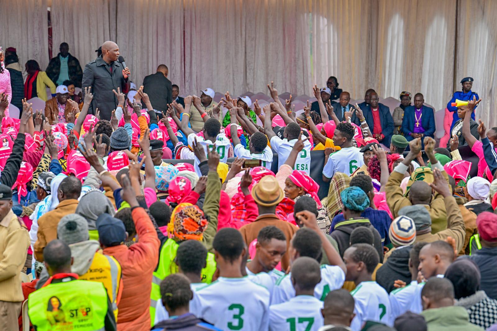 President William Ruto's aide Farouk Kibet engaging with locals among them the Mighty Eagles Soccer Academy players  in Cherangany, Trans Nzoia.