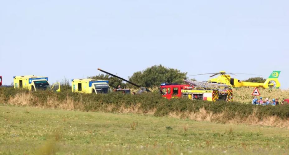 Four on board helicopter that crashed in field