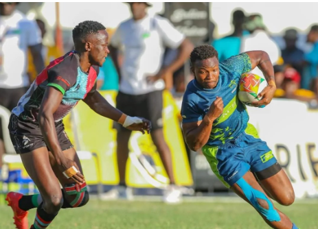 Quins' Amon Wamalwa closes in on KCB playmaker Samuel Asati during a past tournament/HANDOUT