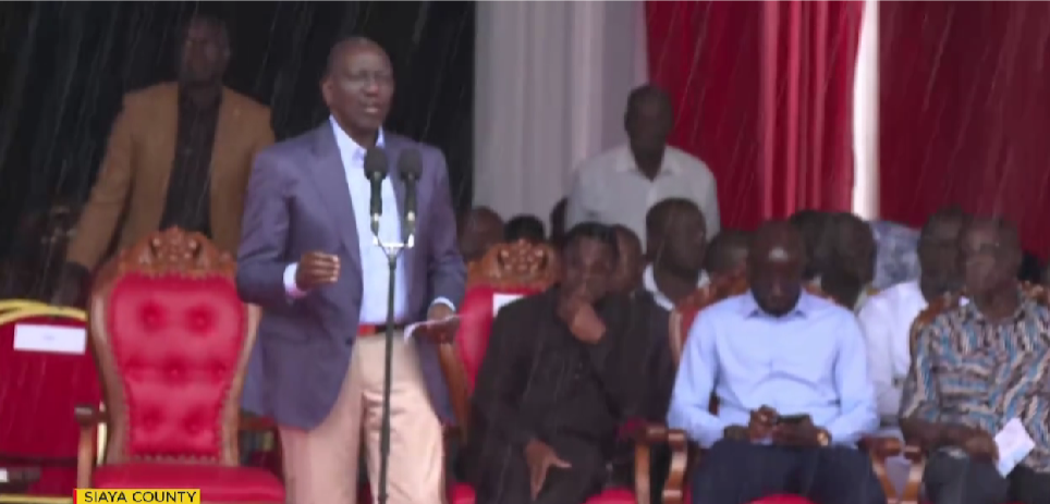 Ruto braves rain to address faithful during service