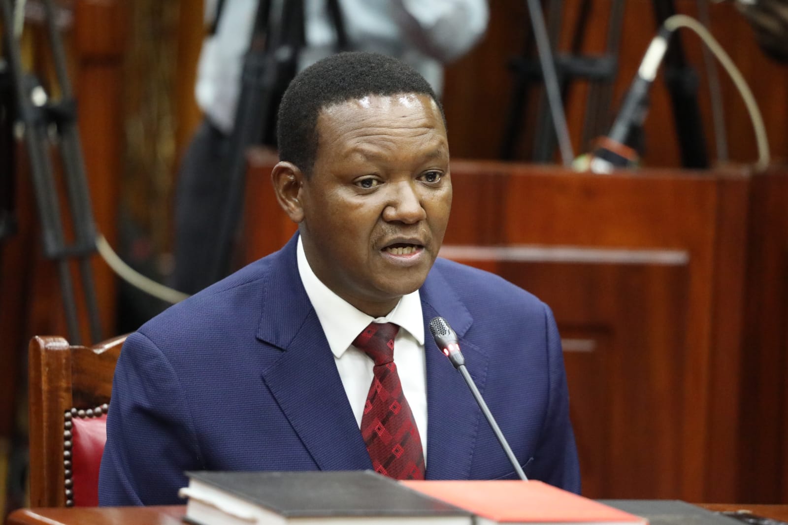 CS Mutua on the spot over rogue recruitment agencies