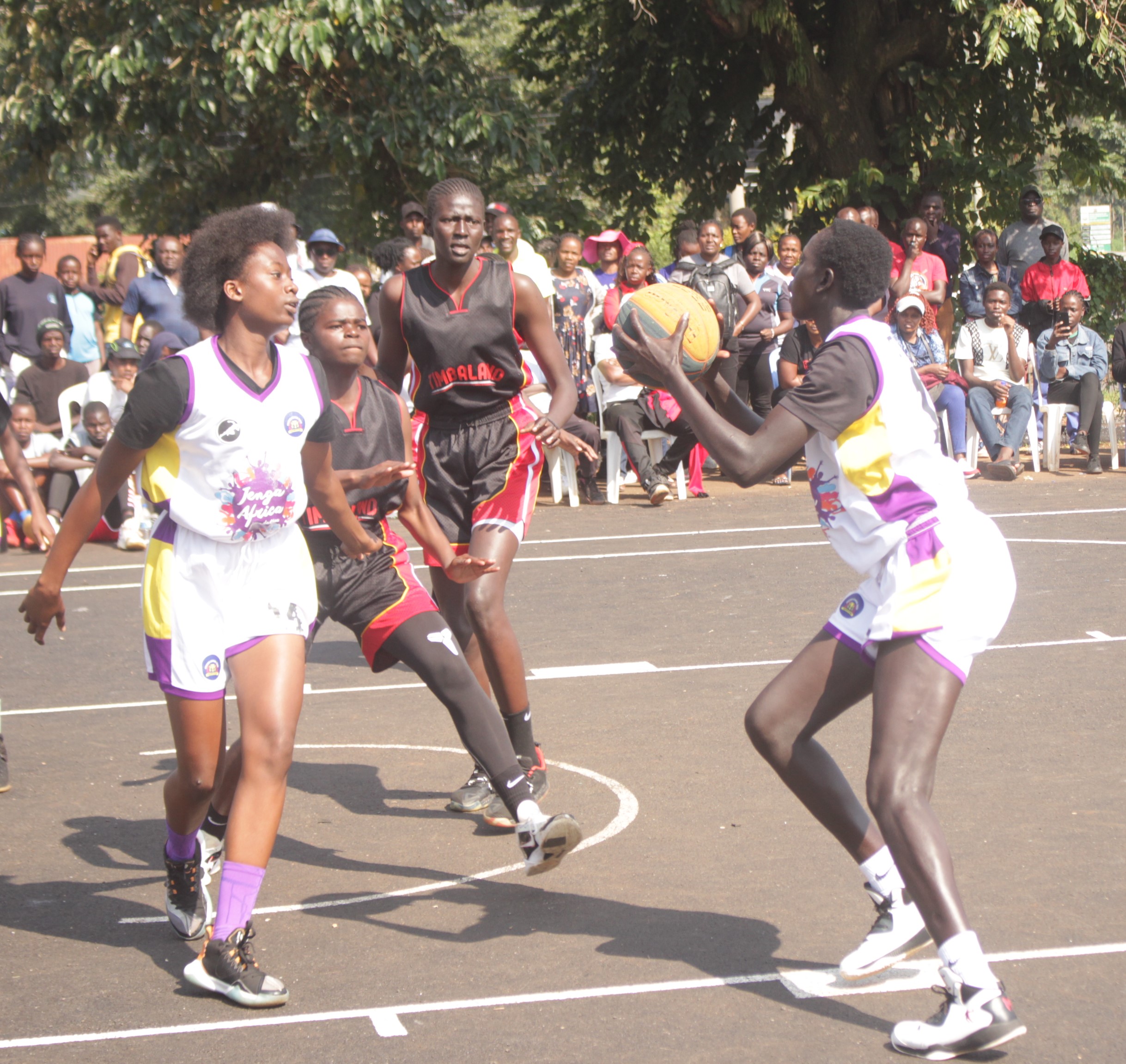 Action between Buruburu (in red) and Tigoi Girls in the 3x3 basketball final at Police Canteen in Kakamega last week