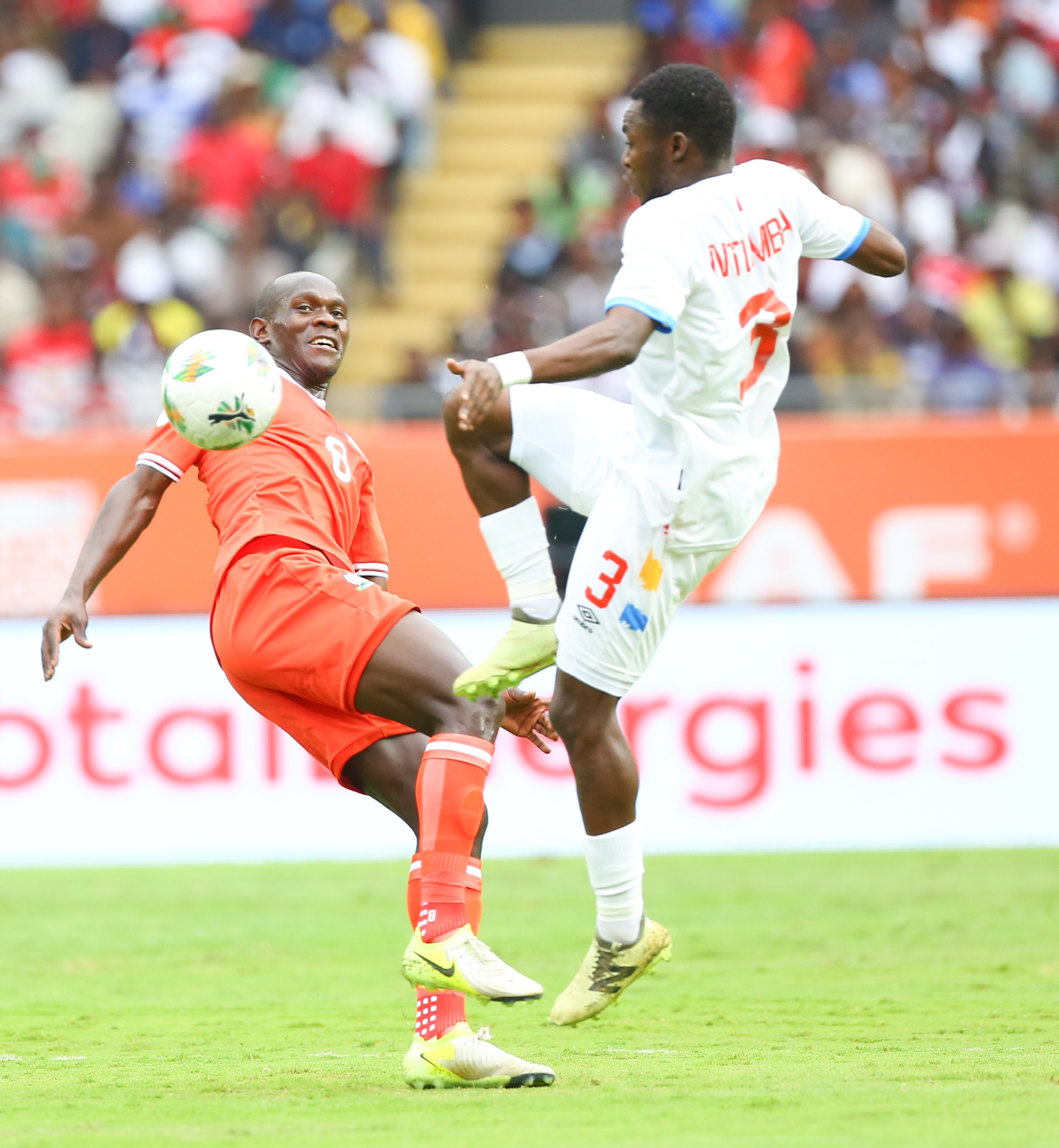 Harambee Stars' Alpha Onyango vies for the ball with Lise Ntumba of DR Congo during a Chan 2024 match at Moi Stadium, Kasarani on Sunday