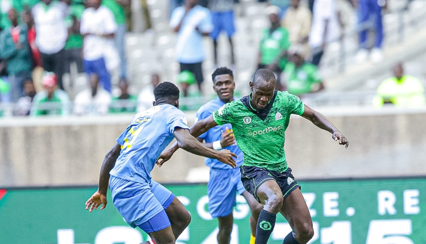 Gor Mahia's Alpha Onyango (R) in action against Bidco United/HANDOUT