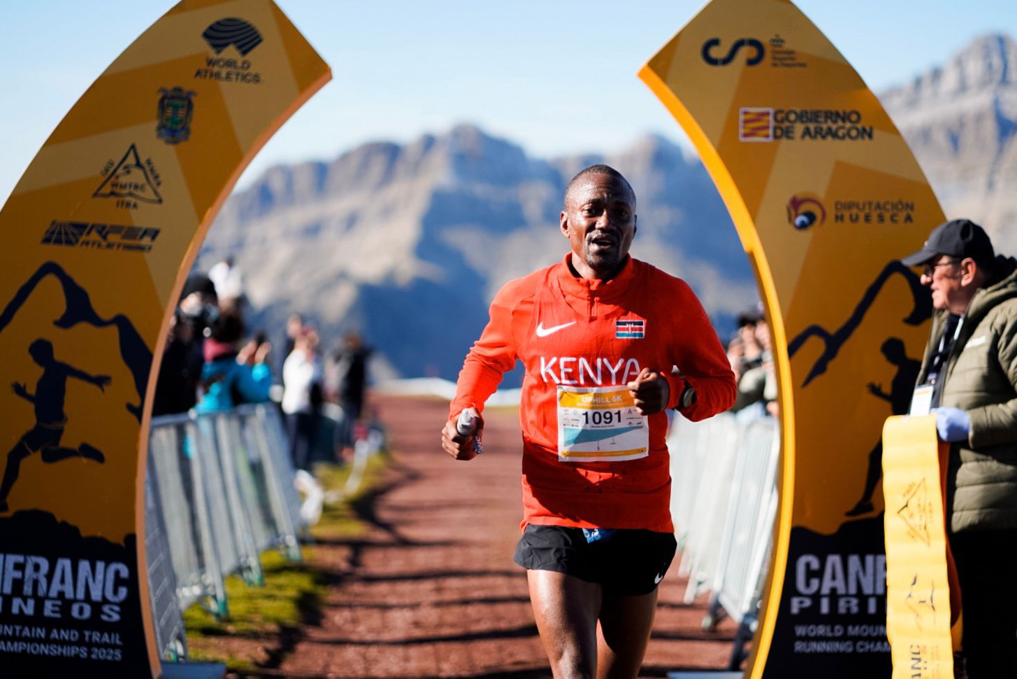 Richard Atuya crosses the finishing line in the men's 6 km uphill race