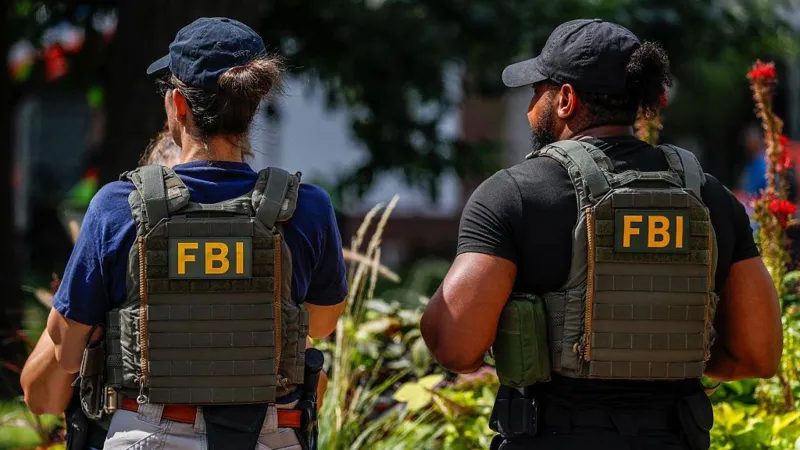 FBI fires agents pictured kneeling at George Floyd protest, US media reports