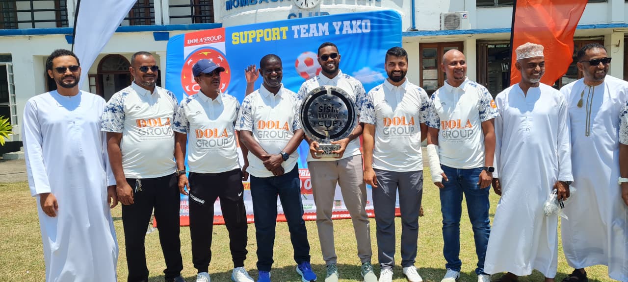 Dola Group of Companies director and other stakeholders at the launch if the Sisi ni Dola Cup at the Mombasa Sports Club on Friday.