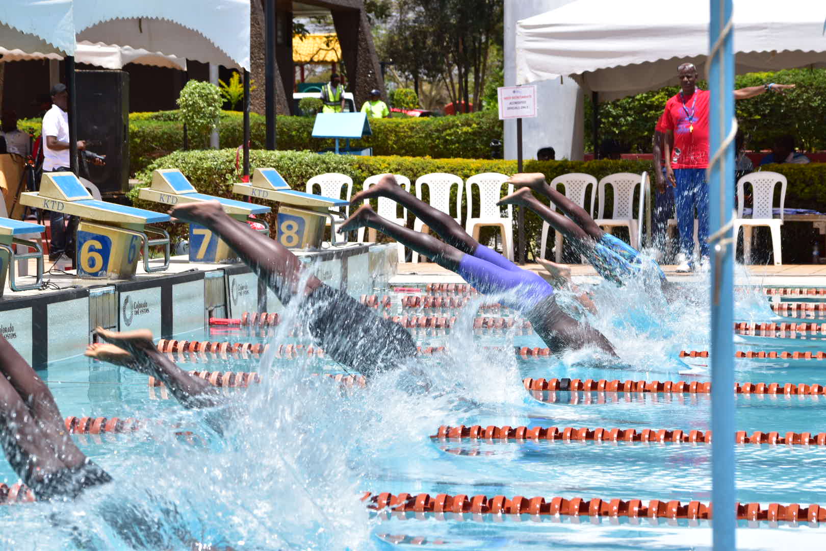 swimmers compete during a race at tghe Africa Aquatic championships