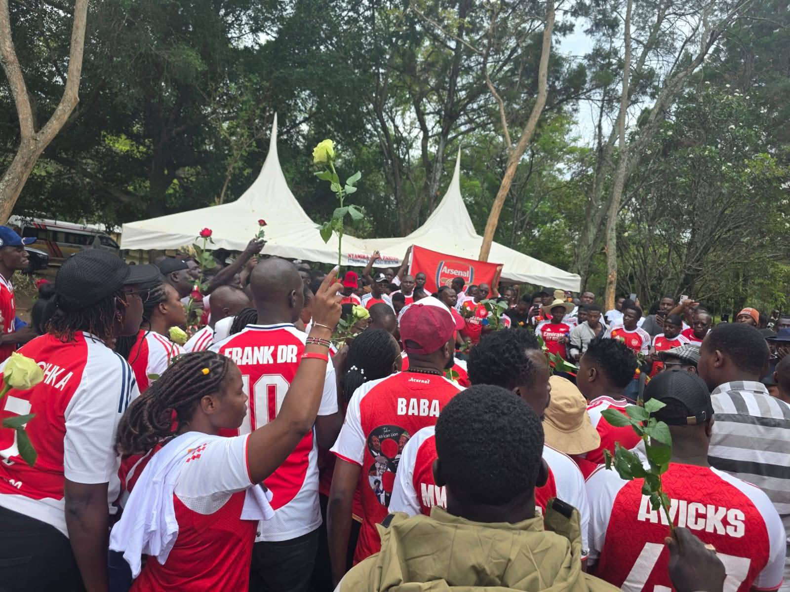 Arsenal fans visit Raila grave in Bondo, pay homage
