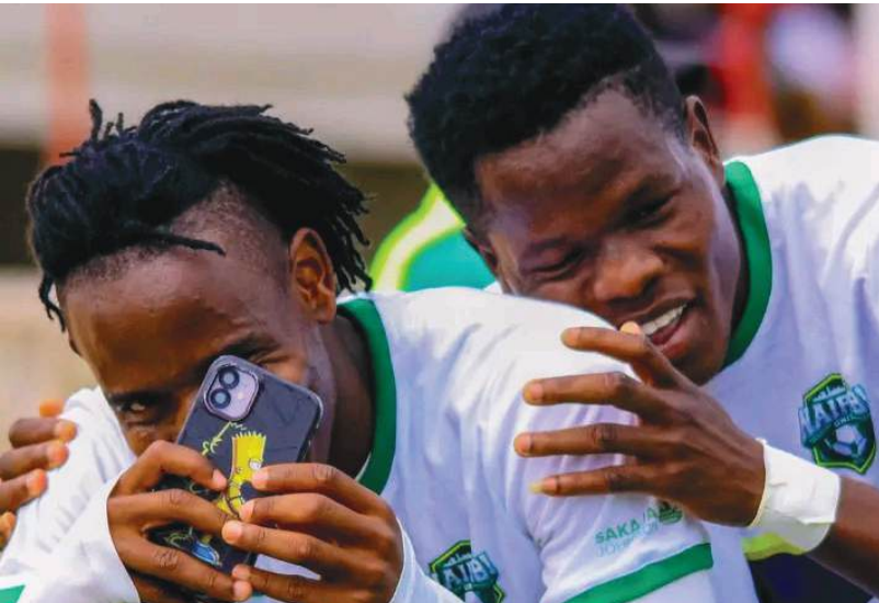Ovella Ochieng (L) and Benson Omala celebrate during a past match /HANDOUT