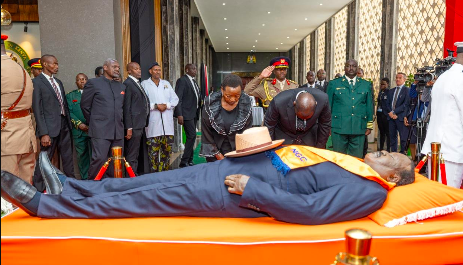 Sombre mood as Ruto views Raila's body at Parliament
