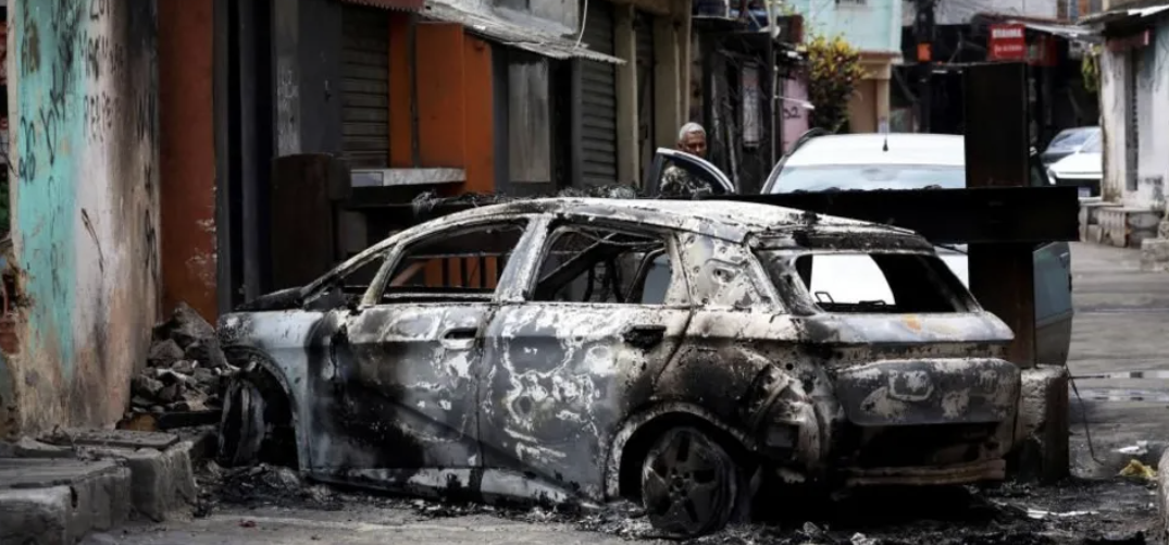 At least 64 killed in Rio's largest police raid on gangs