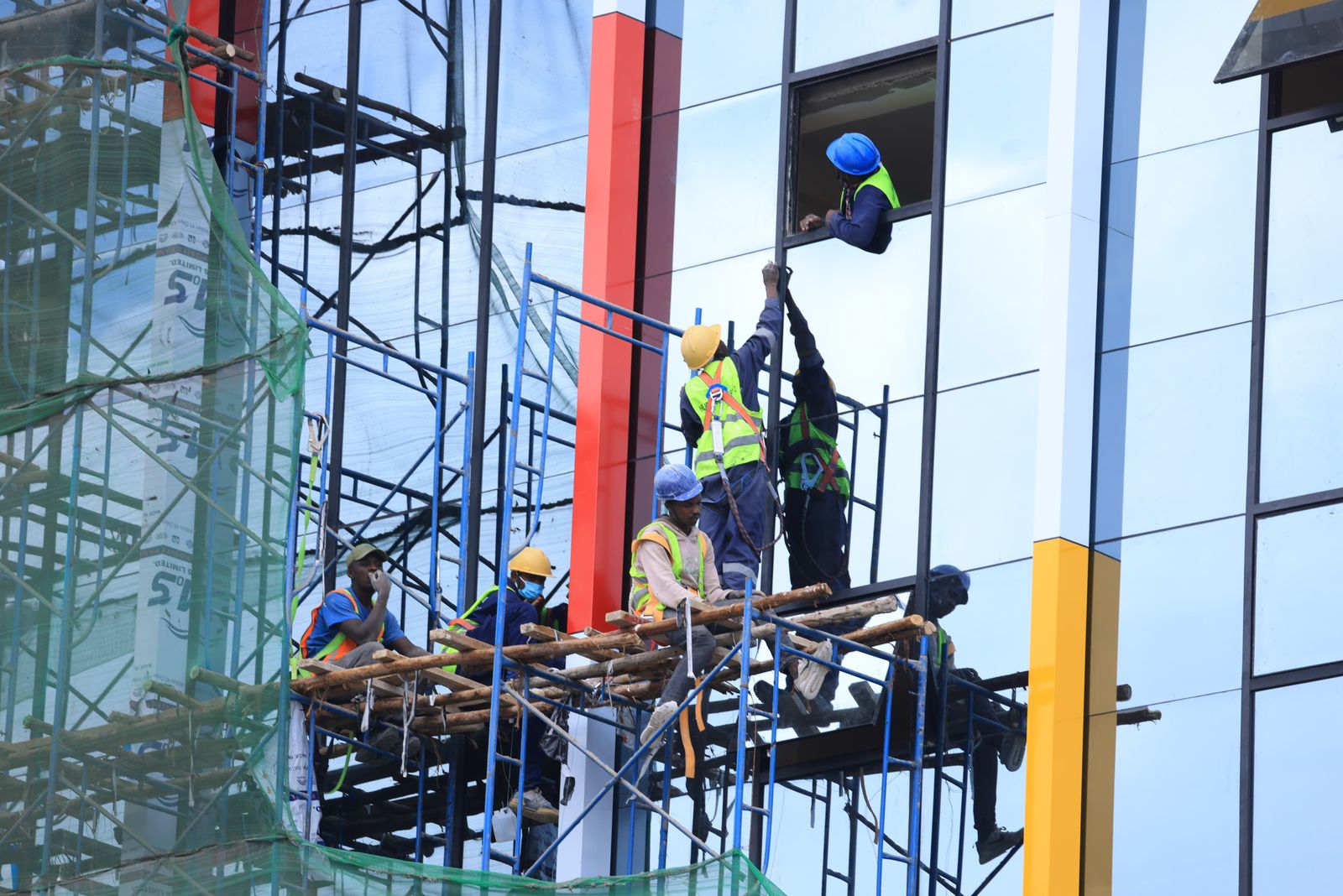 City buildings rush for a fresh coat as ultimatum ticks down
