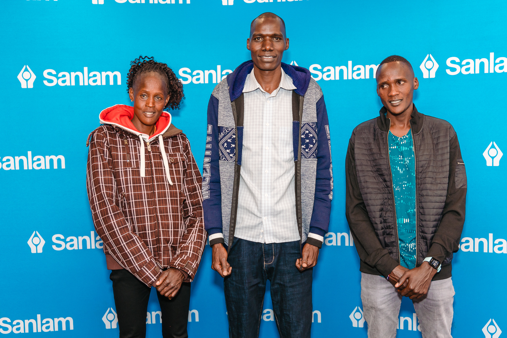 Athletes Fridah Lodepa (L), Japhet Kiplagat and Josephat Kipkoech
