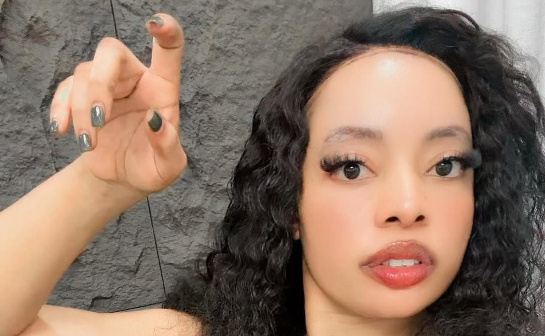 Gloria Ntazola's Cash Display Sparks Social Media Firestorm